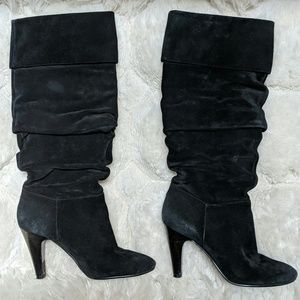 Below knee heeled boots